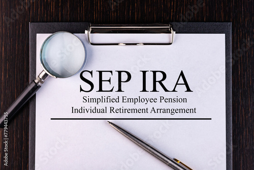 Paper with Simplified Employee Pension Individual Retirement Arrangement SEP IRA on a table photo