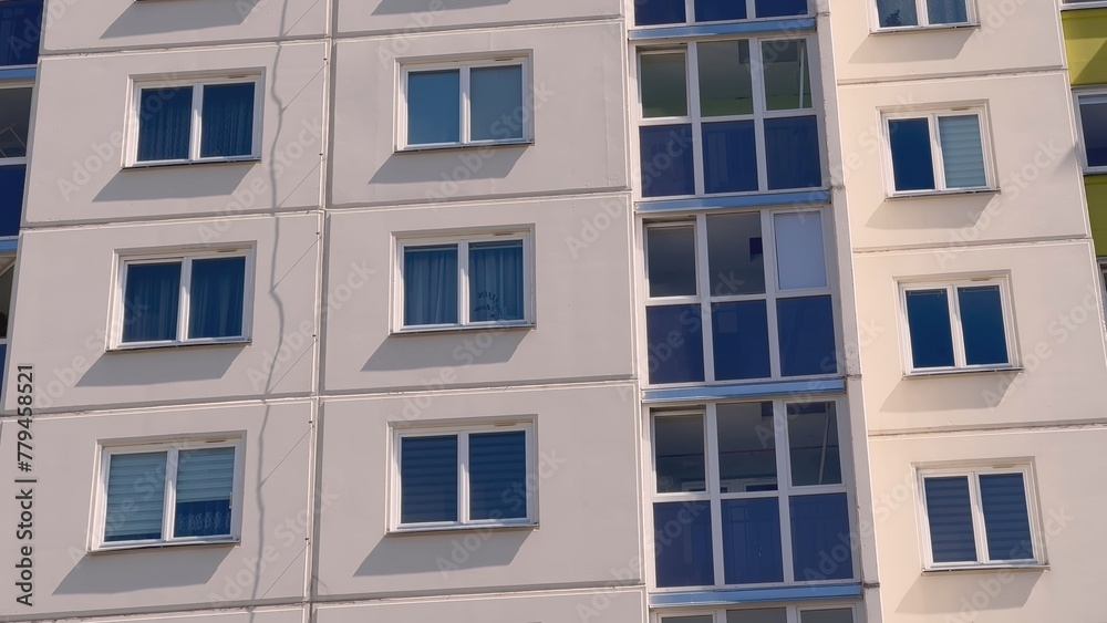 The windows of a residential high-rise building. The windows of a residential high-rise building.