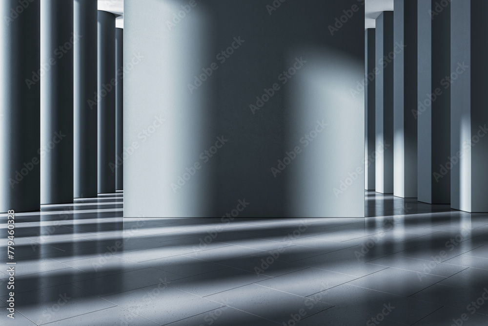 Naklejka premium A modern gallery interior with pillars and shadows on a tiled floor, with a clean, futuristic design and empty space. 3D Rendering