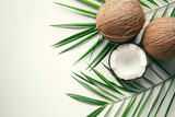 Top view of coconut with leaves on white background
