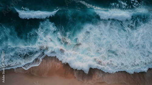 top view of the ocean at twilight after sunset. wild waves foaming point. water of a beautiful dark turquoise hue © Daria Lukoiko