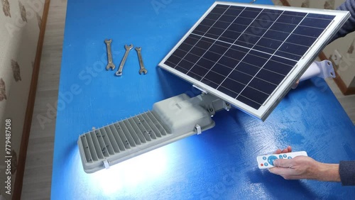 LED street lighting system with solar panel is assembly at home. photo