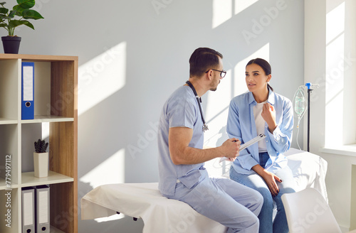 Visit to doctor office, clinic, young female patient describing her symptoms. Woman couch sitting given medical treatment or advice, diagnostic, therapeutic, preventive hospital nurse service