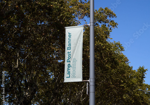 Mockup of customized vertical banner on pole