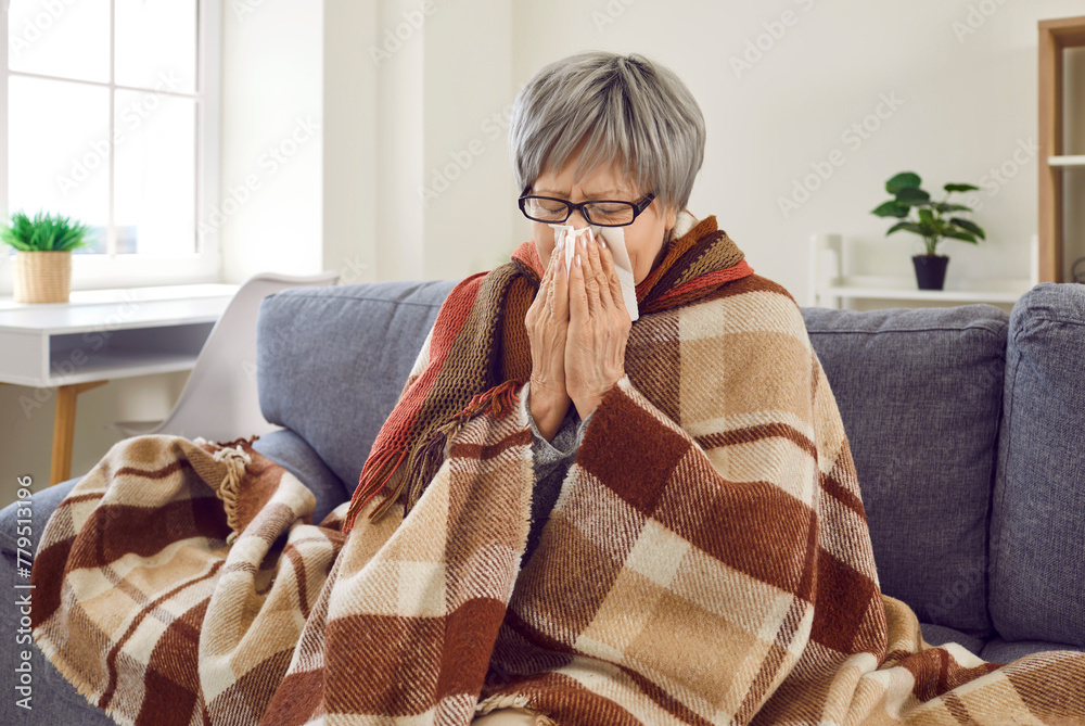 Sick with flu. Unhappy frozen mature woman sick at home and suffering ...