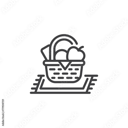 Picnic blanket with a basket of food line icon