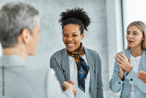 young business businesswoman handshake hand shake shaking meeting agreement office teamwork partner businessman hand startup creative black