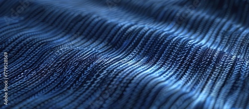 A macro photography shot of a purple knitted fabric with waves resembling eyelashes, in shades of grey and electric blue, showcasing a unique plantinspired pattern photo