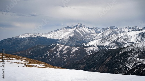 Breathtaking view of snow-peaked mountains © Wirestock