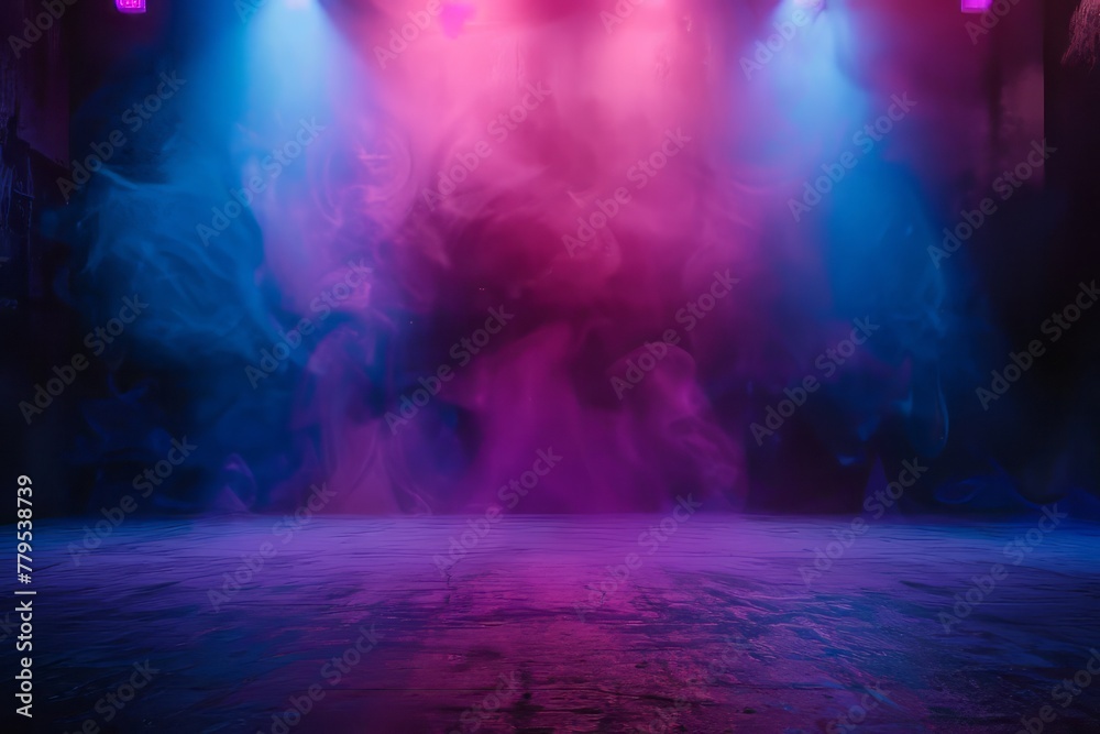 Open stage with a display of colorful lighting and foggy ambiance