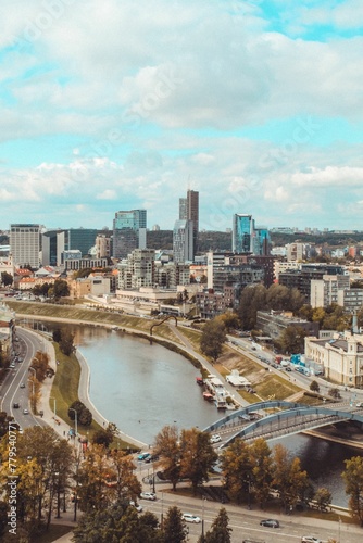Vertical aerial view of the skyline of Vilnius, Lithuania near the water