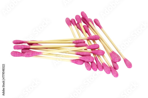 Pink cotton ear swabs highlighted on a white