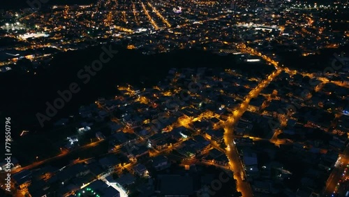 Aerial shot of the Portoviejo in Manabi province, Ecuador at night photo