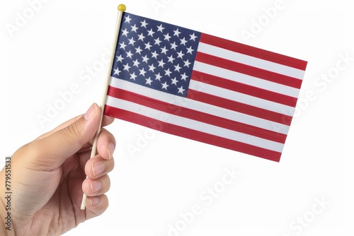 Hand holding an American flag isolated on a white background.  © KP