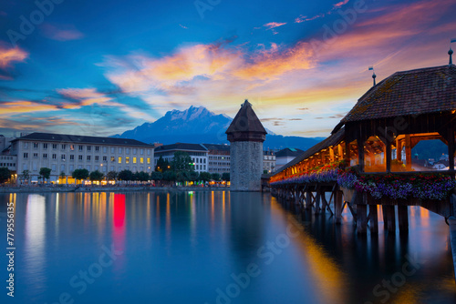 Sunset in historic city center of Lucerne with famous Chapel Bridge and lake Lucerne (Vierwaldstattersee), Canton of Lucerne, Switzerland