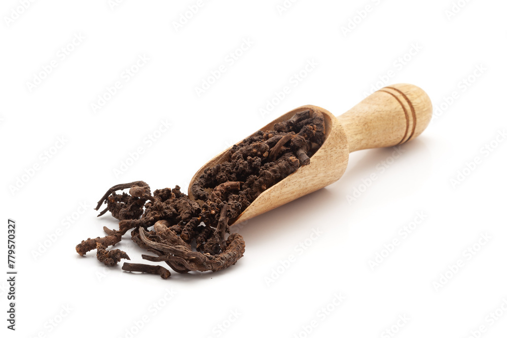 Front view of a wooden scoop filled with Organic Nirgundi (Vitex negundo) roots. Isolated on a white background Front view of a wooden scoop filled with Organic Nirgundi (Vitex negundo) roots. Isolated on a white background
