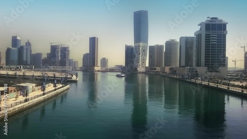 Dubai Creek view taken from the bridge, ai generated © Wirestock