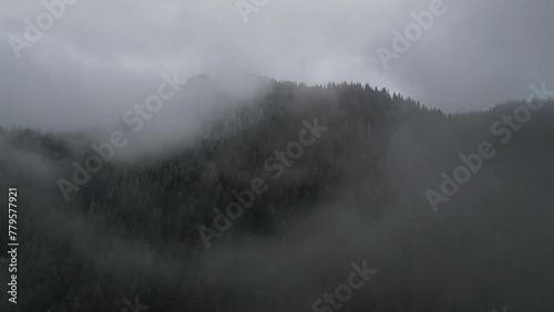 Aerial view of a foggy sky over the Bicaz Mountains in Romania photo