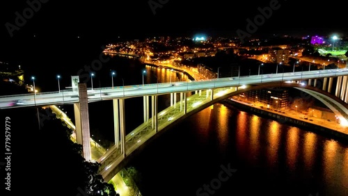 Night Hyperlapse footage of over Arrabida Bridge in Porto, Portugal photo