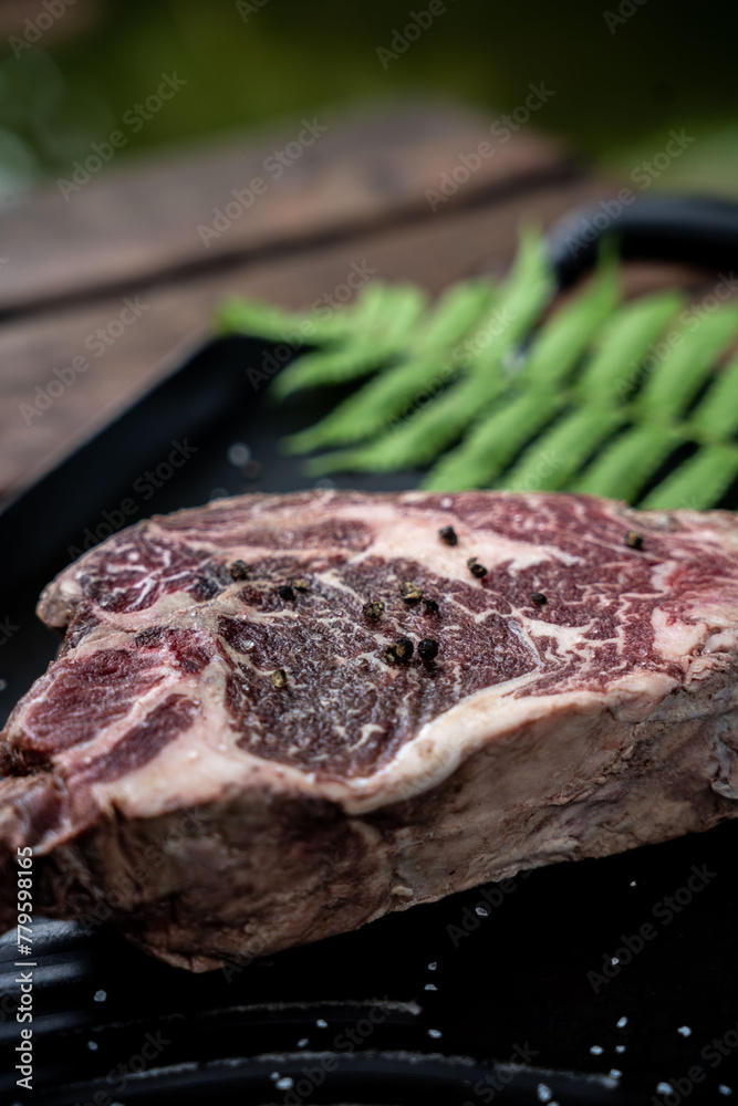 Obraz premium Beautiful shot of a raw steak meat
