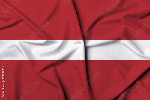 Beautifully waving and striped Latvia flag, flag background texture with vibrant colors and fabric background