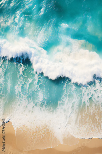 Aerial View of Turquoise Waves Crashing on a Golden Sandy Beach