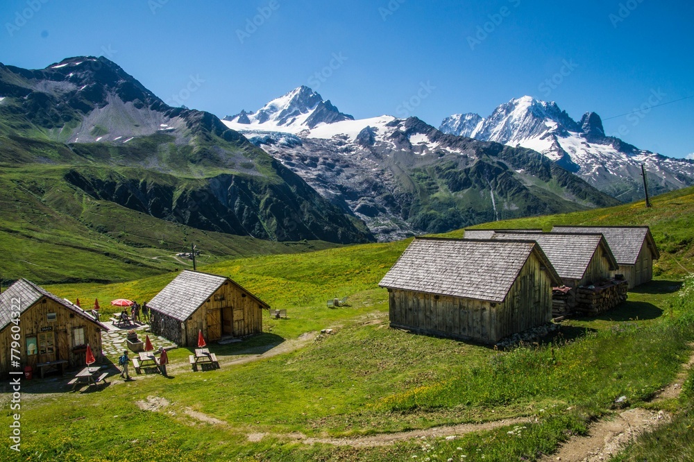 Landscape scene of rural houses on green hills in charamillon gondola alps in Haute Savoie, France