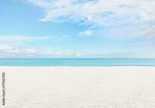 Panoramic view of the beach with turquoise sea sands and a sunlit azure sky with clouds. Banner with copy space for summer beach holiday getaway in idyllic location, booking travel and resort stays