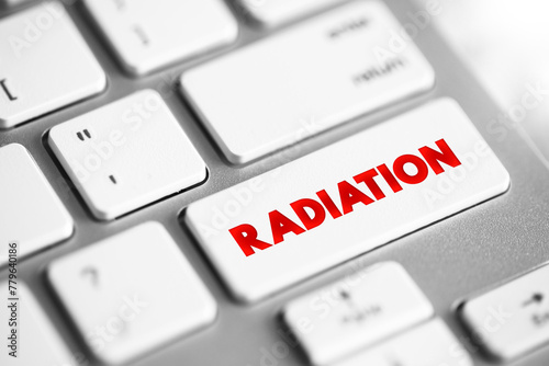 Radiation is energy that comes from a source and travels through space at the speed of light, text concept button on keyboard