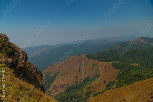 A mountain range with a clear blue sky in the background © InfoSoul