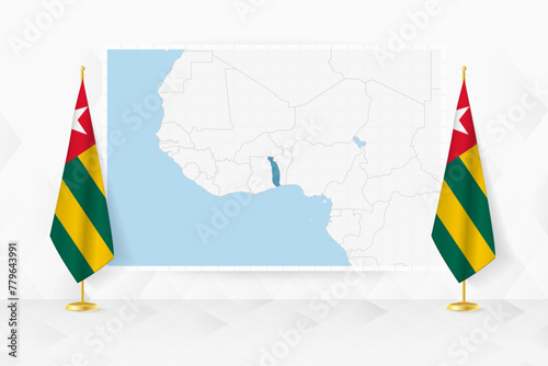 Map of Togo and flags of Togo on flag stand.