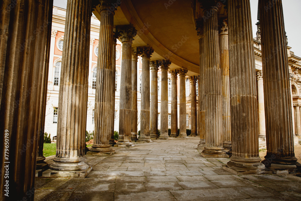 Set of classical Corinthian columns, adorned with intricate carvings, standing tall