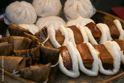 Chinese bao stuffed with roasted pork belly cooked in the Chinese district of Nankinmachi in the city of Kobe in Japan. photo