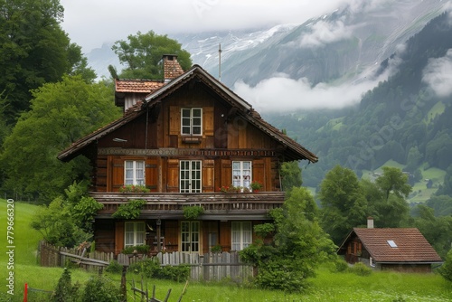 A single house stands in the middle of a vast field with majestic mountains visible in the distance, A quaint Swiss chalet in the Alps, AI Generated