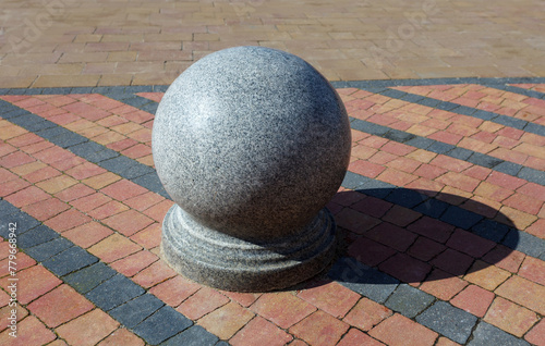 Stone road blocker in the shape of a ball