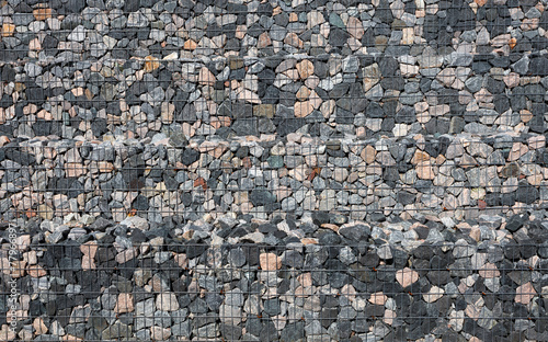 A stepped wall of gabions. Background image, texture