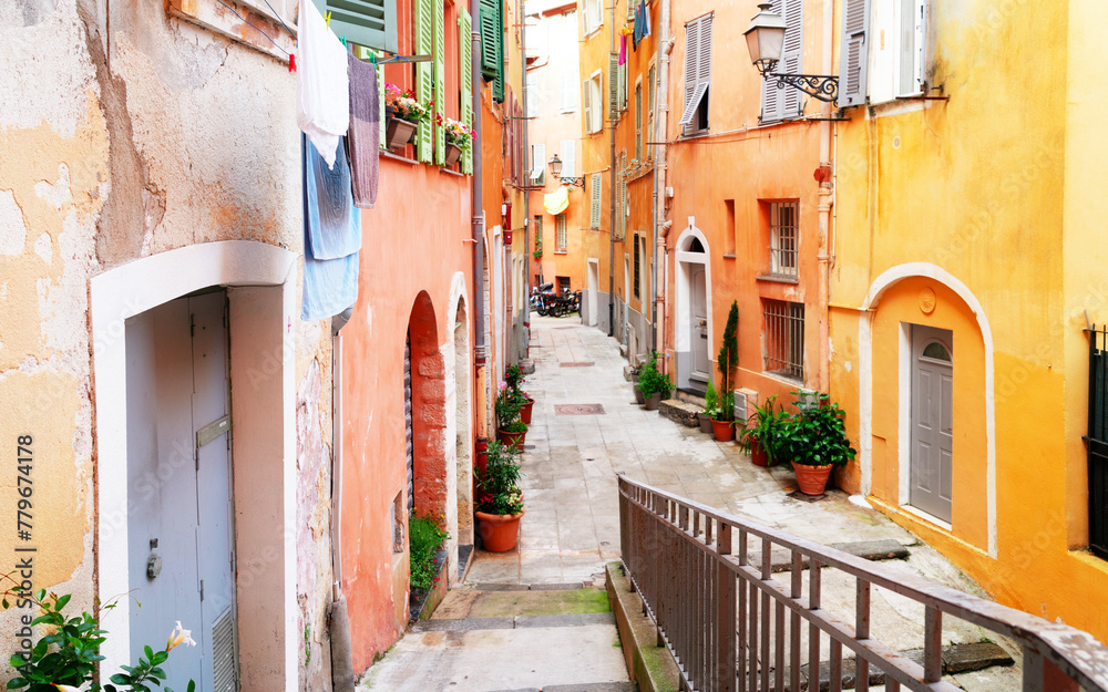 Fototapeta premium cosy street in old town of Nice, France