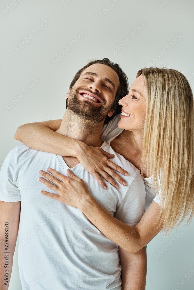 A man and a woman sharing a warm, passionate hug, expressing deep love and connection. A man and a woman sharing a warm, passionate hug, expressing deep love and connection.