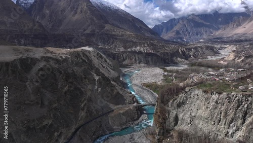 Karakoram Highway along Indus River in Hunza Valley, Pakistan. Gilgit-Baltistan, Himalayas Mountains, Aerial Drone Shot