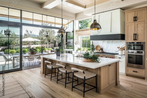 kitchen with an island with glass doors leading to the garden