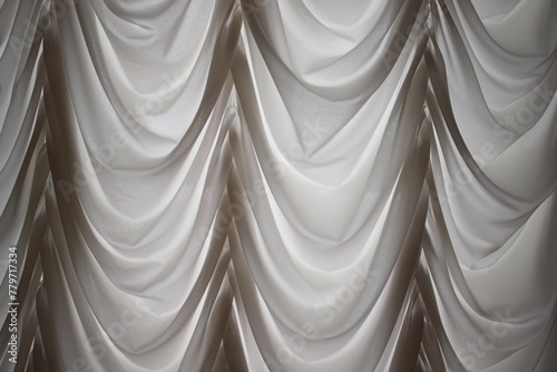 the undulating texture of the curtains