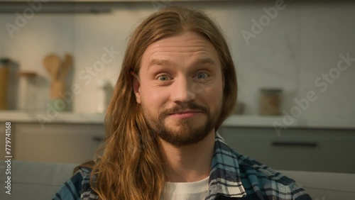 Close up portrait at home apartment indoors Caucasian happy man excited guy amazed wonder surprise male homeowner renter at rent house amazing news reaction open mouth big eyes wide shock unbelievable