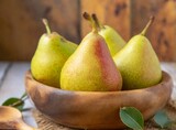 Pears isolated on wooden bowl