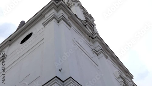 Downtown Calvinist Church, or popularly known as Kakas Church in Miskolc, at Kossuth Lajos utca 17. Late Baroque, Classicist style, historic tower. Eastern main facade shows strongly geometric shapes photo