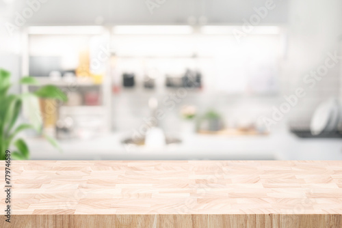 Selective focus.End grain wood counter,table top on blur kitchen counter in morning background.