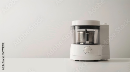 Modern high-tech food processor on a white background with minimalist design