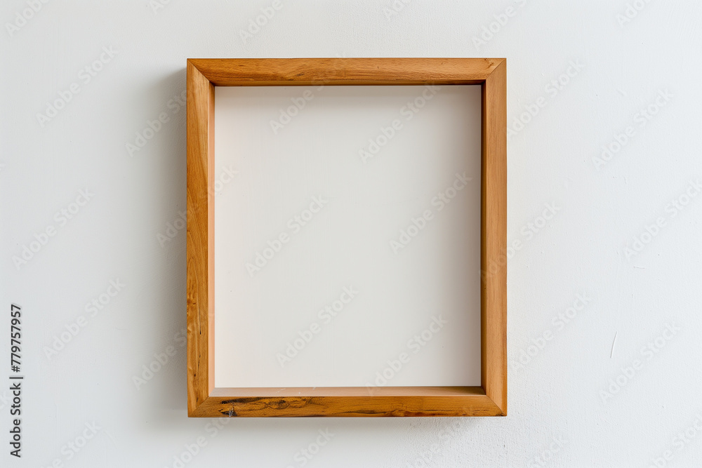A natural wood frame displayed on a clean white backdrop A natural wood frame displayed on a clean white backdrop