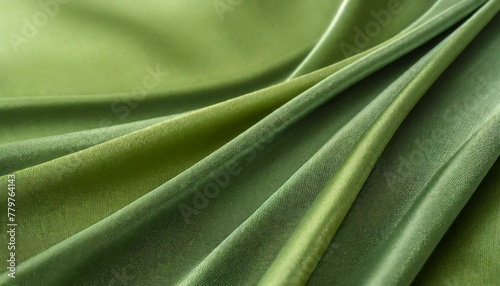 Beautiful smooth green cloth background. photo