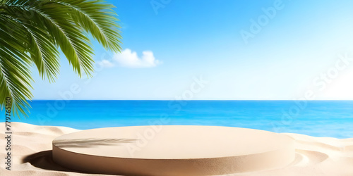 A sandy podium. A palm tree stands on a sandy beach overlooking the vast ocean under a clear blue sky