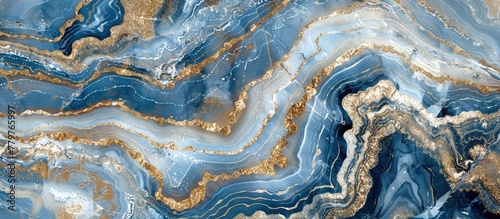 A detailed closeup capturing the intricate pattern of blue and gold marble, resembling electric blue waves in a natural landscape. A stunning fusion of art and geology